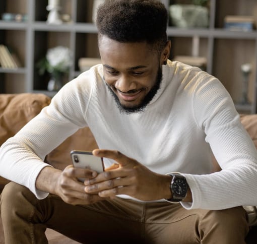 man texting on his phone using meet app